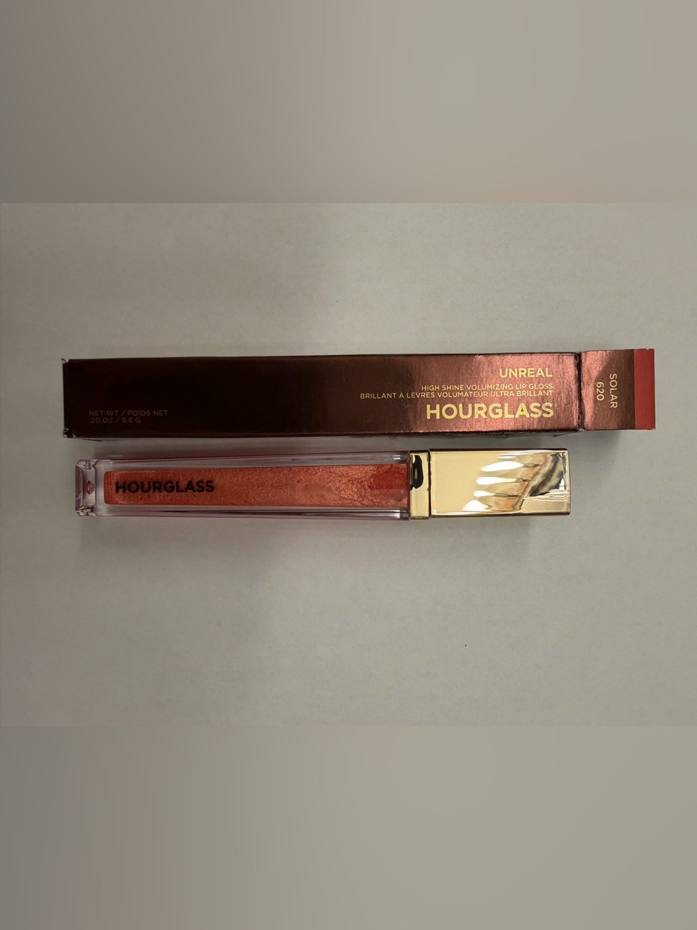 Hourglass High Shine Volumizing Lip Gloss - Shimmery Copper Orange
